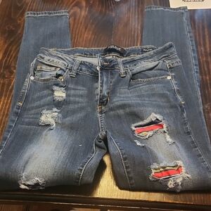 Judy Blue Distressed Blue Skinny Jeans with Multicolor Patch Detail